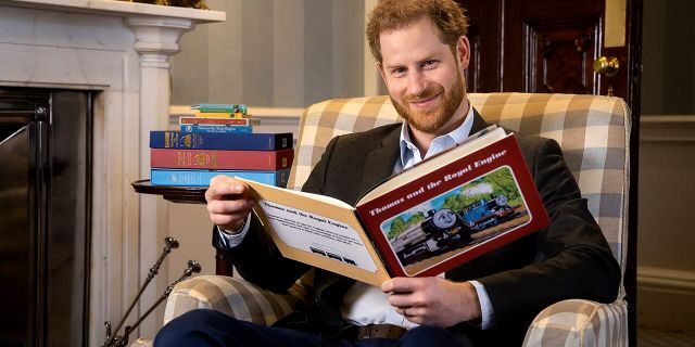 In this January 2020 photo and made available on Monday, April 27, 2020, by Mattel, Britain's Prince Harry poses for a photo during the recording of his introduction to the new animated special 'Thomas &amp; Friends: The Royal Engine'. Set when Prince Harry's father, Prince Charles was a boy, Thomas has to take Sir Topham Hatt, the controller of the railway, to Buckingham Palace to receive an honor.