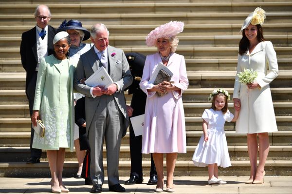 Doria Ragland, Prince Charles, Camilla, Duchess of Cornwall, and Kate Middleton holding Charlotte's hand as they leave the ch