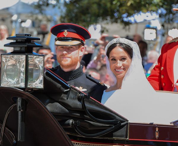 The Duke and Duchess of Sussex leave Windsor Castle in the Ascot Landau carriage during a procession after their nuptials.&nb