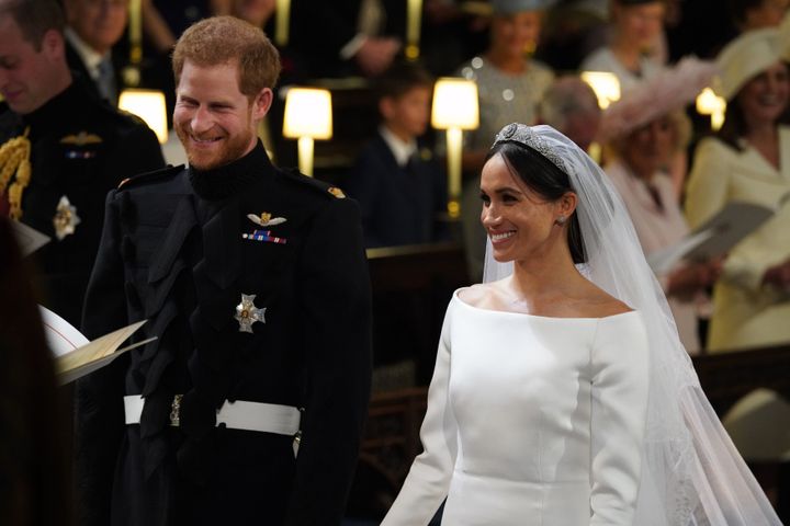 Harry and Meghan arrive at the High Altar for their wedding ceremony at St. George's Chapel, Windsor Castle, on May 19, 2018.