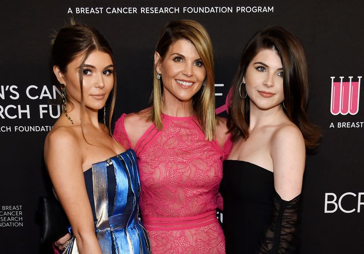 Lori Loughlin, center, poses with daughters Olivia Jade Giannulli, left, and Isabella Rose Giannulli in 2019.