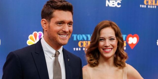 Singer Michael Buble (L) and Luisana Lopilato walk on the red carpet for "Tony Bennett Celebrates 90: The Best Is Yet to Come" at the legendary Radio City Music Hall in New York.