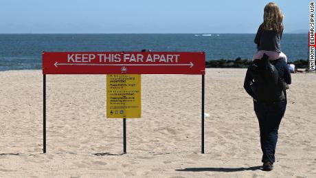 Some beaches will have police to enforce social distancing rules over Memorial Day weekend 