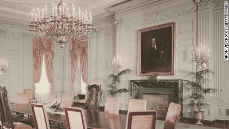 A portrait of former President Abraham Lincoln by George Peter Alexander Healy hangs above the fireplace in the State Dining Room in the White House in 1962. 