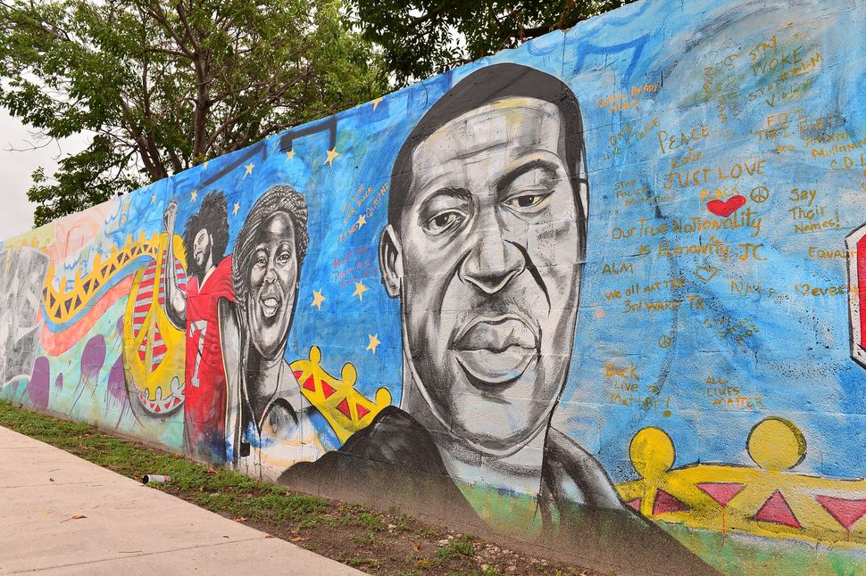 A mural of former NFL quarterback Colin Kaepernick and George Floyd on June 5 in Miami, Florida, as protesters demonstrate ag