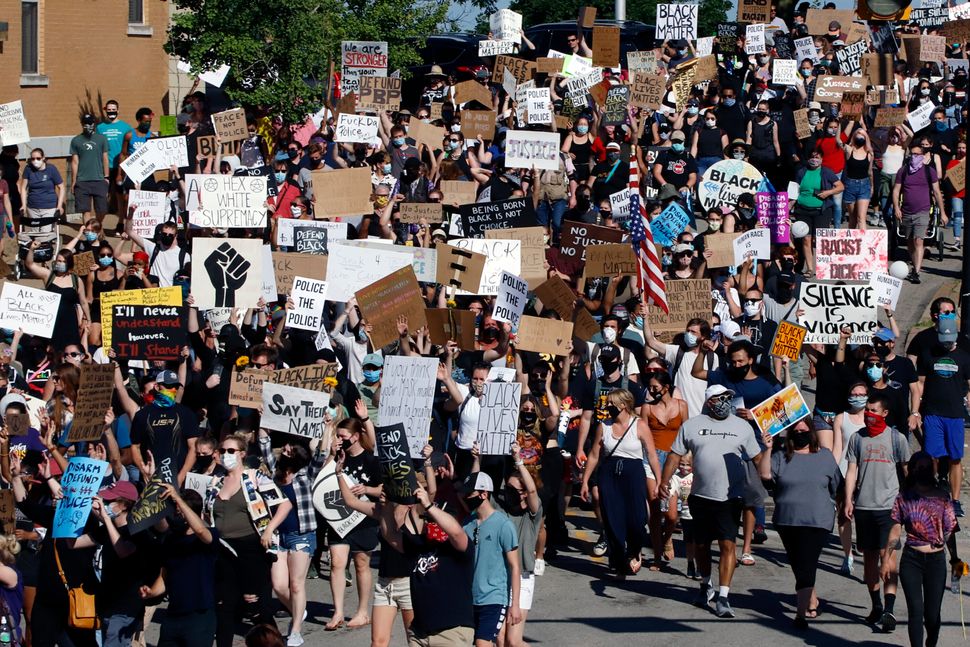 Protesters participating in a Black Lives Matter rally march to Downtown Pittsburgh from Mount Washington on June 7 to protes