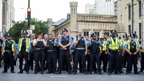 Chicago police line up on Michigan Avenue during a march in July 2016 against police violence.