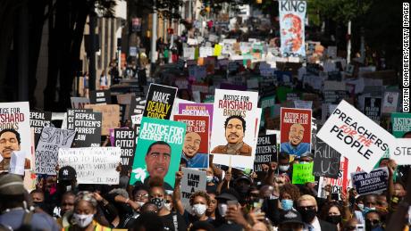 Protesters marched in Atlanta demanding an end to racial bias and police brutality.