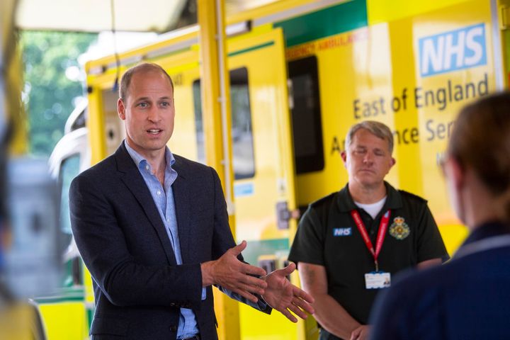 Prince William meets paramedic staff while maintaining social distancing during a visit to the ambulance station in King's Ly