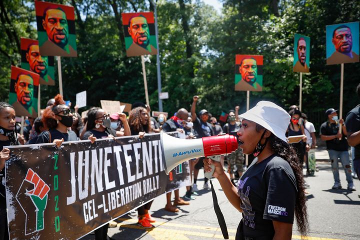 Protesters chant and march after a Juneteenth rally at the Brooklyn Museum in that New York City borough on June 19.