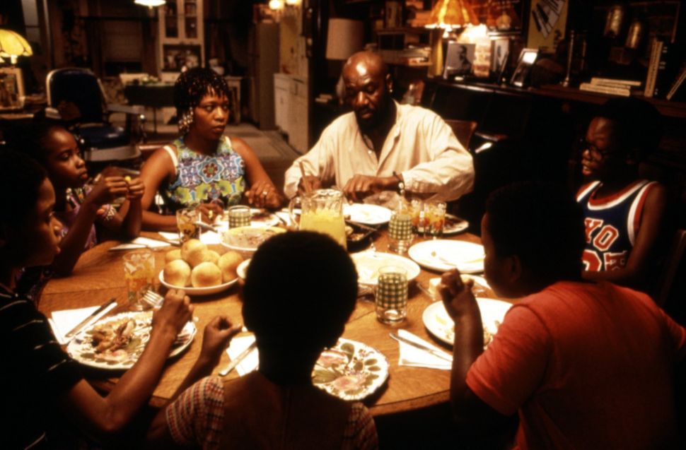 Alfre Woodard, Delroy Lindo and their fictional children in "Crooklyn."