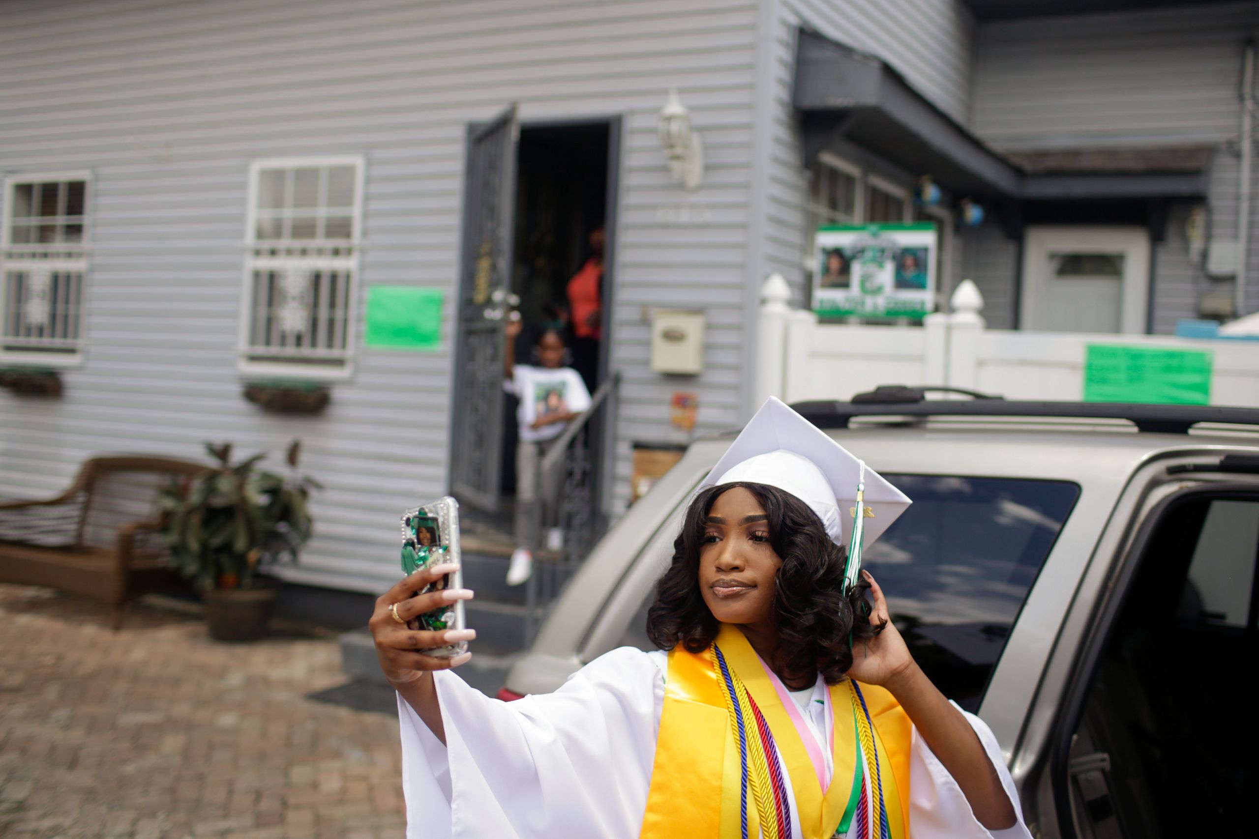 Satoriya Lambert takes a selfie before heading to her high school graduation ceremony on May 27.