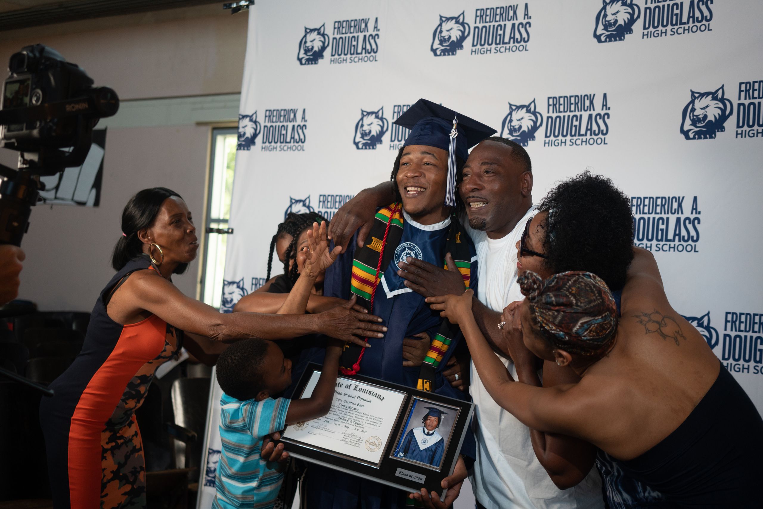 Jarrin Rainey celebrates with his proud family, including grandmother Sheila Rainey, left, after his graduation ceremony at F