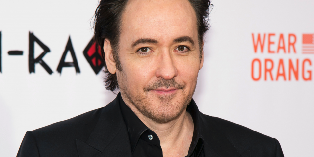 John Cusack filmed an altercation with a police officer at a protest in Chicago.