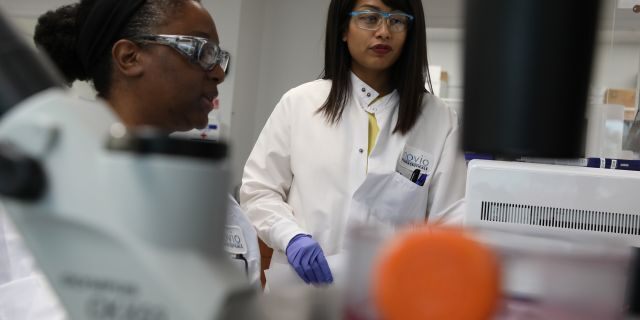 INOVIO scientists at work in the laboratory. (Photo courtesy of INOVIO Pharmaceuticals)