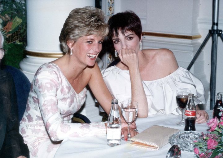 Diana, Princess of Wales, laughs with Liza Minnelli at a party following the charity film premiere of "Stepping Out" on Sep. 