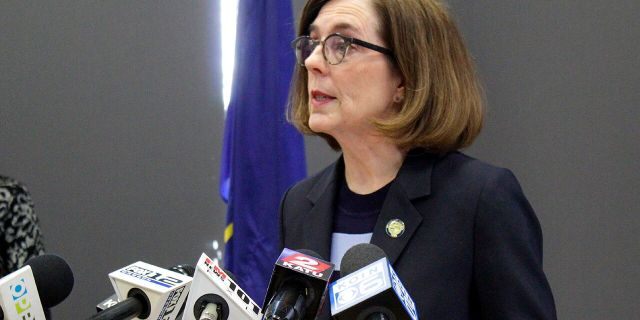 Oregon Gov. Kate Brown speaks at a news conference in Portland, Ore, March 16, 2020. The Oregon Supreme Court has upheld the governor's shutdown orders aimed at preventing the spread of the coronavirus. (Associated Press)