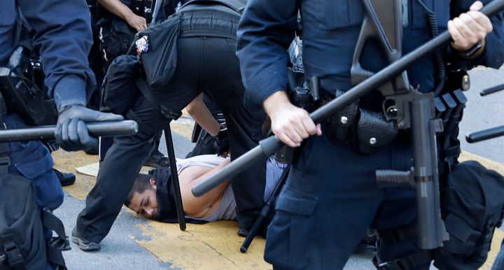 A protester is arrested on Friday in San Jose, California.