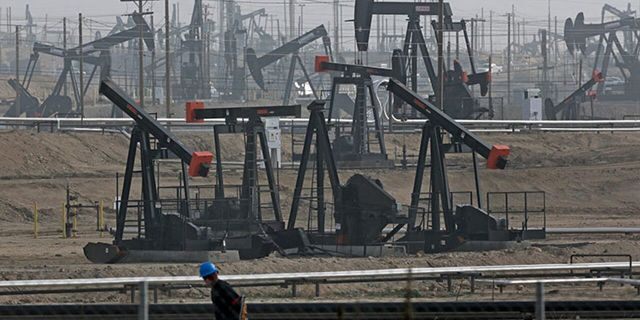 Pumpjacks operate at the Kern River Oil Field, Friday, Jan. 16, 2015, in Bakersfield, Calif. A new study shows proximity to active oil and gas wells is linked to adverse birth outcomes for mothers in rural areas. (AP Photo/Jae C. Hong)