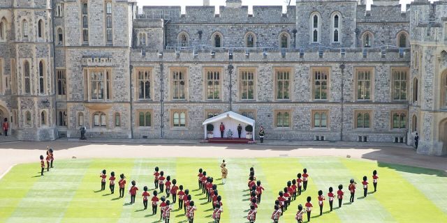 A general view of Trooping The Colour, the Queen's birthday ceremony at Windsor Castle on June 13, 2020 in Windsor, England. In line with Government advice, it was agreed that The Queen's Birthday Parade, also known as Trooping the Colour, would not go ahead in its traditional form. 