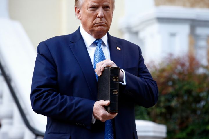 President Donald Trump holds a Bible outside St. John's Church in Washington, D.C., on Monday night. Faith leaders say they w