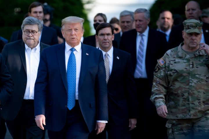 President Donald Trump walks to St. John's Church from the White House with Attorney General William Barr, Secretary of Defen