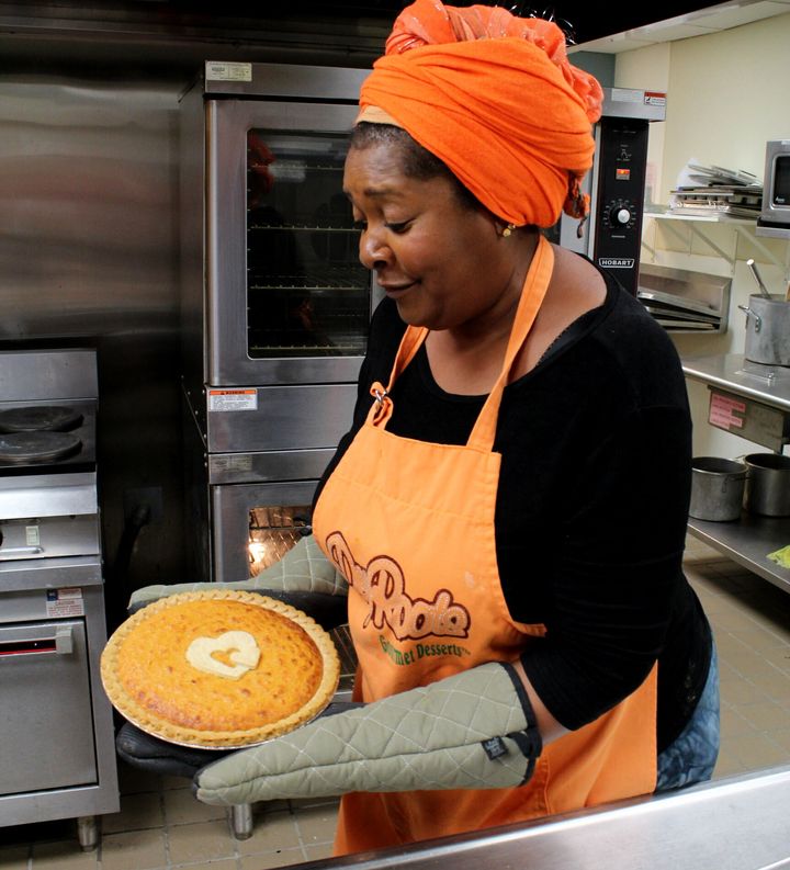 Rose McGee takes one of her famous Sweet Potato Comfort Pies out of the oven.