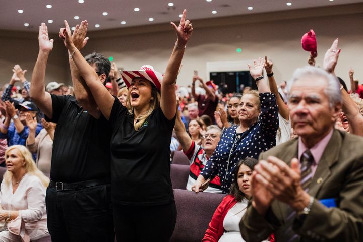 Attendees cheer as Trump addresses evangelicals at the Jan. 3 rally in Miami.
