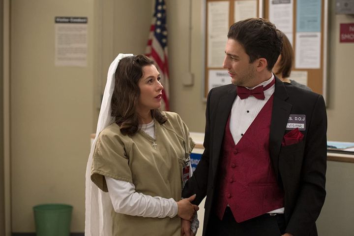 Magaro with Yael Stone in an episode of "Orange Is the New Black." He appeared in 11 episodes of the popular Netflix series.