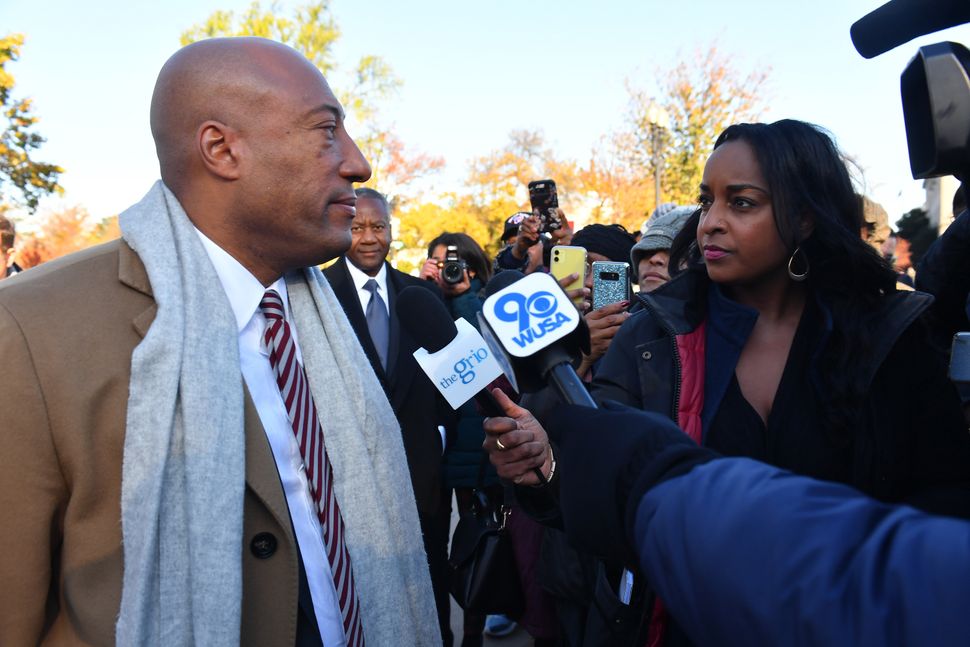 Natasha Alford (right) and The Grio owner Byron Allen, in front of the Supreme Court in November 2019.