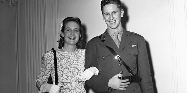 Lieutenant Cord Meyer, Jr., USMC, aide to Commander Harold Stassen, with his bride, the former Mary Pinchot, daughter of the late Amos Pinchot and niece of the former Governor of Pennsylvania, Gifford Pinchot, after their marriage at the home of the bride, 1165 Park Ave.