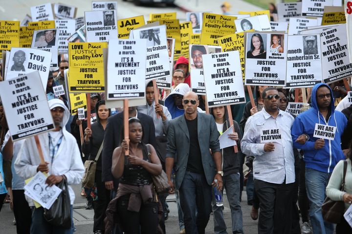 People in Los Angeles silently protest racial injustice and demand justice for Trayvon Martin.