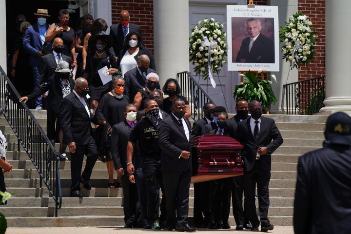 ATLANTA, GA - JULY 23: The casket holding the body of civil rights icon C.T. Vivian is carried out of Providence Missionary B