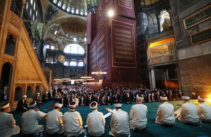 Imams read sermons as Friday as dignitaries, including Turkey's President Recep Tayyip Erdogan, take part in Friday prayers a