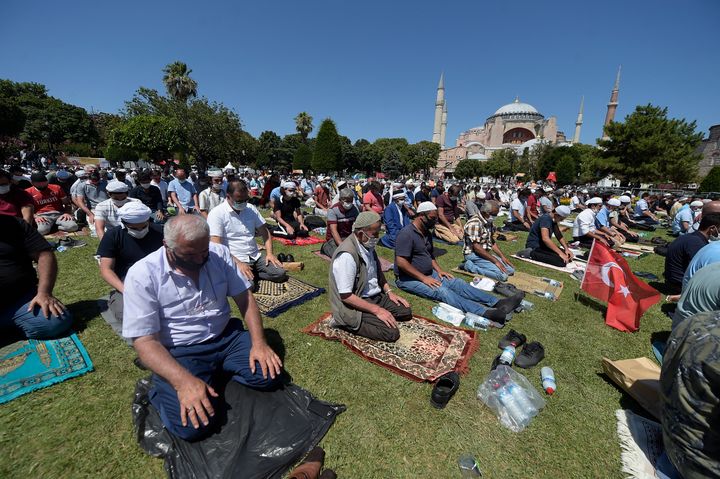 Muslims pray during Friday prayers in the historic Sultanahmet district of Istanbul, near the Byzantine-era Hagia Sophia, in 