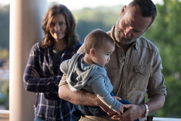 Maggie, Rick and Baby Hershel probably thinking how great it is that Negan isn't there.