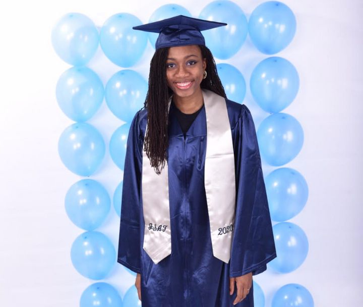 Turney-Zapata graduated early at the age of 16. Her father, Josh Jackson, took this socially distanced graduation photo.
