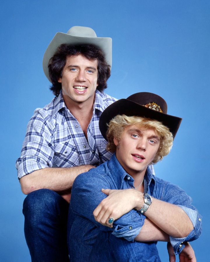 Tom Wopat (left) and John Schneider in a promotional portrait for "The Dukes of Hazzard." On the show, they drove a customize