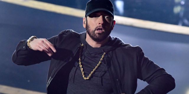 Eminem performs onstage during the 92nd Oscars (Photo by MARK RALSTON/AFP via Getty Images)