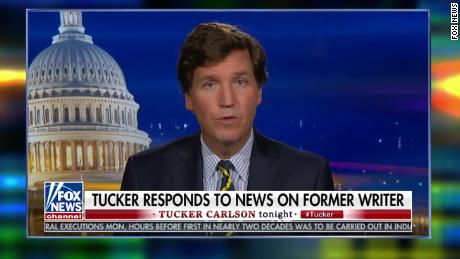 Tucker Carlson addresses ex-staffer&#39;s racist posts, says he will take &#39;long-planned&#39; vacation