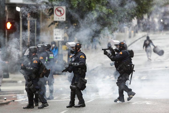 Police use tear gas amid anti-racist protests in Seattle on May 30.