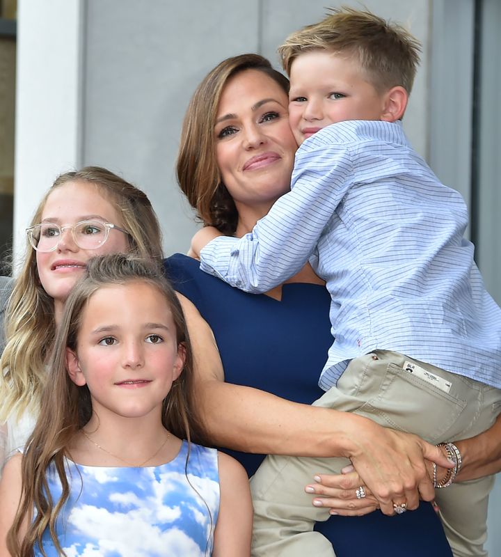 Jennifer Garner poses with her three children during her 2018 Hollywood Walk of Fame ceremony.