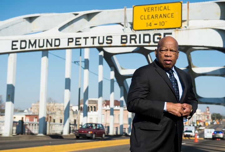 Rep. John Lewis stands on the Edmund Pettus Bridge in Selma, Alabama, in between television interviews on Feb. 14, 2015.