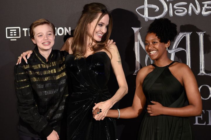 Angelina Jolie and her children Shiloh Jolie-Pitt (left) and Zahara Jolie-Pitt at a premiere in 2019.&nbsp;