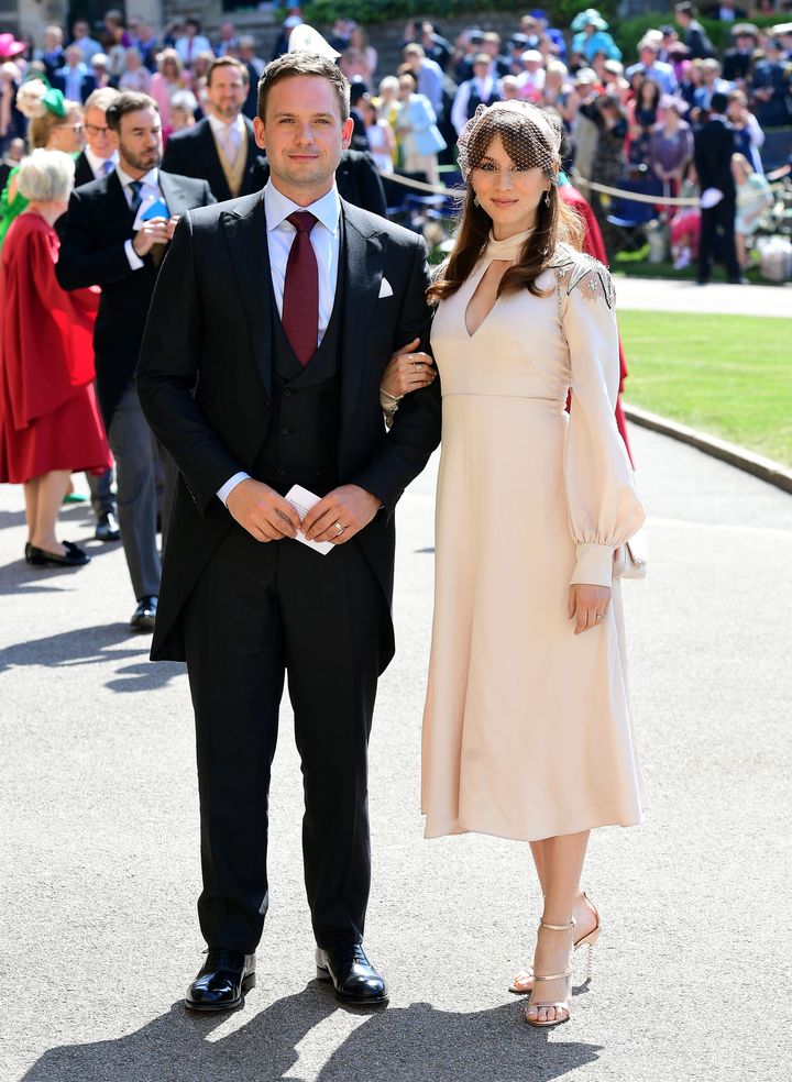 Patrick J. Adams and Troian Bellisario arrive at St George's Chapel at Windsor Castle before the wedding of Prince Harry to M