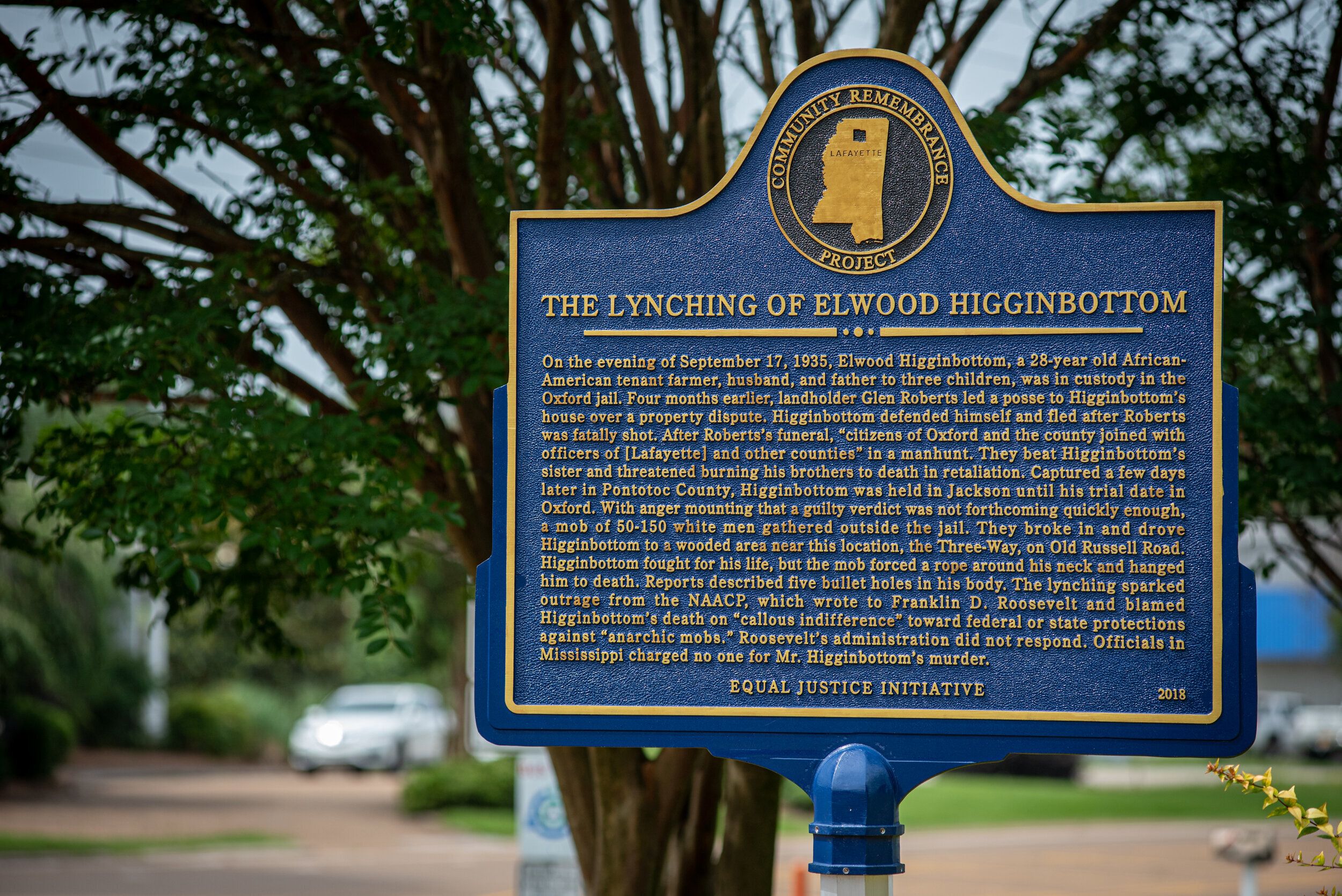 A commemorative plaque marks the spot of the 1935 lynching of Elwood Higginbottom in Oxford, Mississippi. Studies show that a