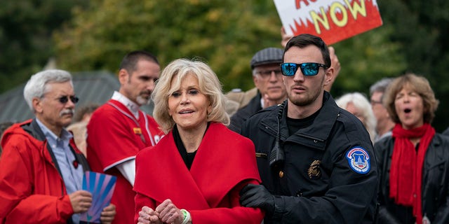 In this Oct. 25, 2019, file photo, actress and activist Jane Fonda is arrested at the Capitol for blocking the street after she and other demonstrators called on Congress for action to address climate change, in Washington, D.C.